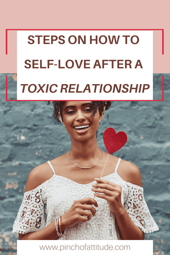 Pinterest - Pin with title "Steps on How to Self-Love After a Toxic Relationship" showing a beautiful black woman in a white blouse grinning while holding a stick of red heart.