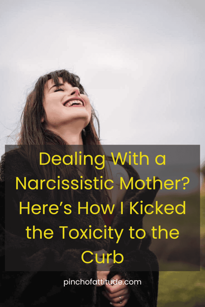 Pinterest - Pin with title "Dealing With a Narcissistic Mother? Here’s How I Kicked the Toxicity to the Curb" showing a smiling woman with her head tilted back, outdoors.