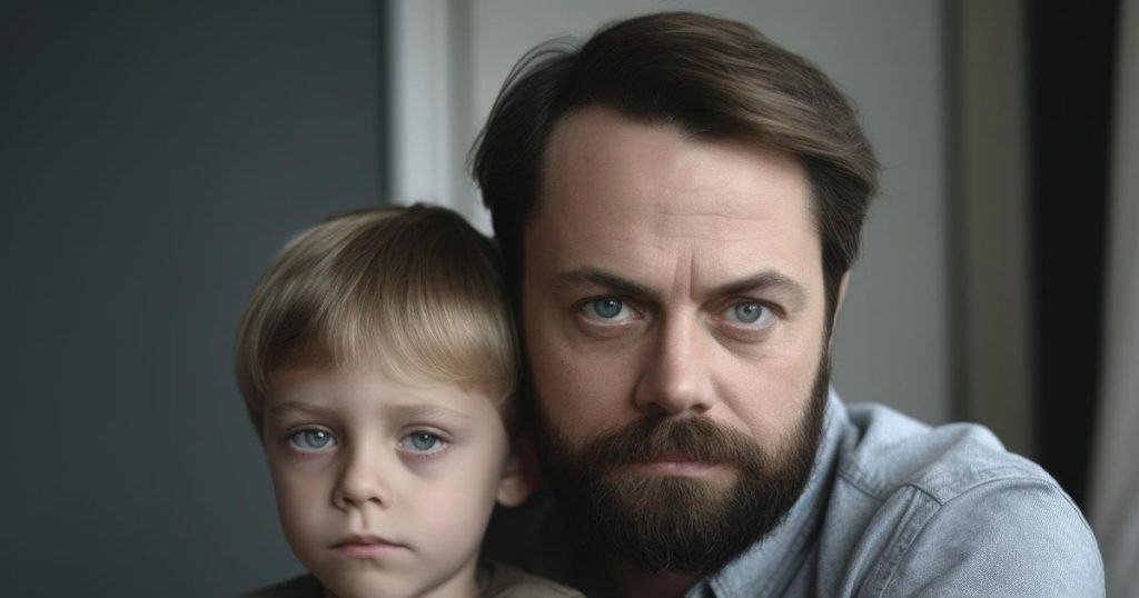 a photo of a serious looking father and his son who looks scare of his father symbolizing a narcissistic father's control over his son's life.
