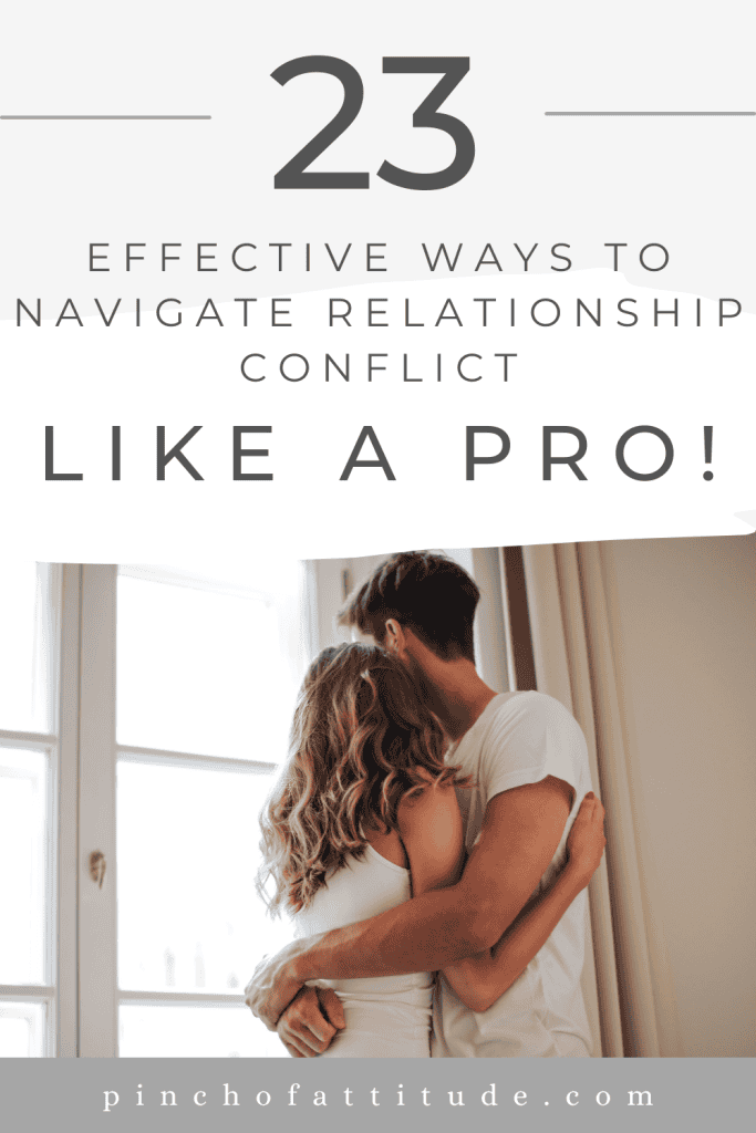 Pinterest - Pin with title "23 Effective Ways to Navigate Relationship Conflict Like a Pro!" showing a couple in white tops hugging each other while looking out the window.