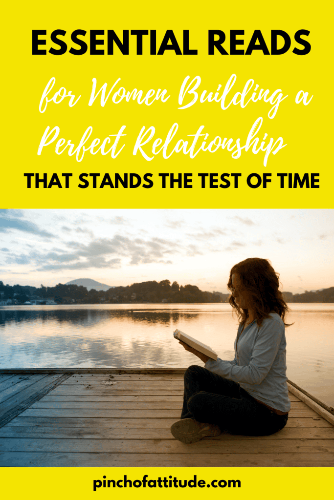 Pinterest - Pin with title "Essential Reads for Women Building a Perfect Relationship That Stands the Test of Time" showing a woman sitting on a wooden dock by a serene lake at sunset while reading a book.