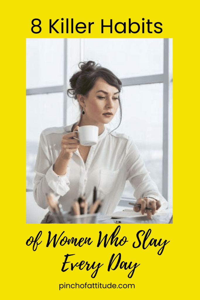 Pinterest - Pin with title "8 Killer Habits of Women Who Slay Every Day" showing a woman in a white blouse holding a coffee cup, sitting at a desk.