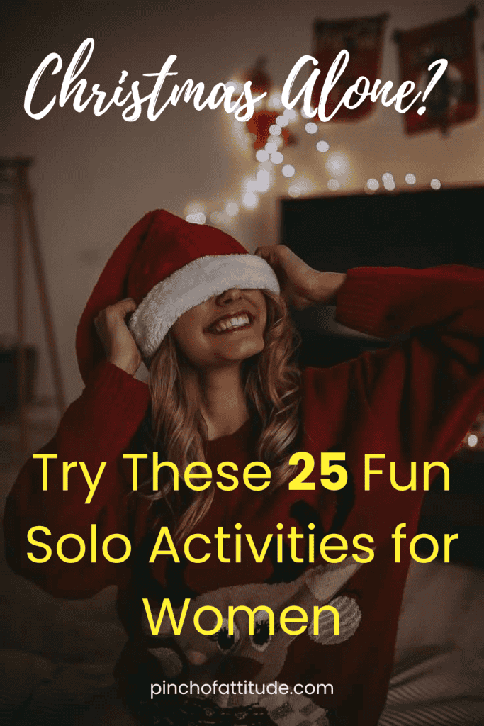 Pinterest - Pin with title "Christmas Alone? Try These 25 Fun Solo Activities for Women" showing a woman wearing a Santa hat indoors with holiday lights in the background.