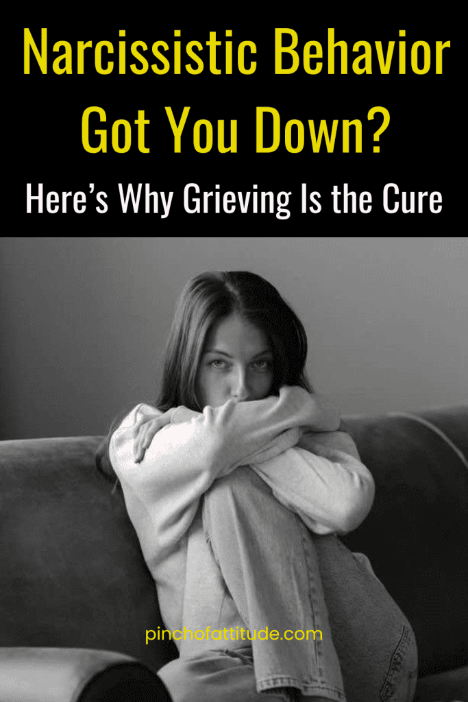 Pinterest - Pin with title "Narcissistic Behavior Got You Down? Here’s Why Grieving Is the Cure" featuring a black-and-white image of a woman sitting on a couch with her arms wrapped around her knees, looking thoughtfully ahead.