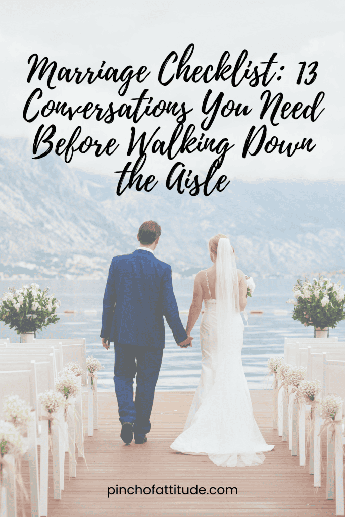 Pinterest - Pin with title "Marriage Checklist: 13 Conversations You Need Before Walking Down the Aisle" showing a couple holding hands while walking on a dock with a scenic background of mountains and water.