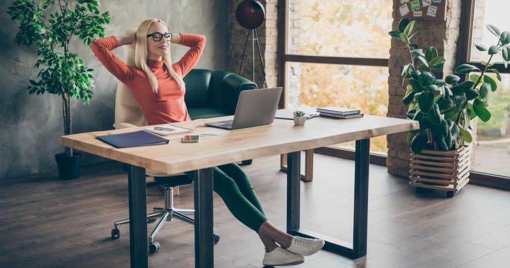 woman sitting her desk working.