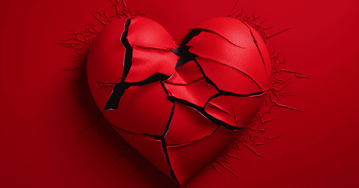 A vividly red heart is shown cracked and splintered into sharp, jagged fragments, with pieces breaking away against a red background, symbolizing emotional damage. This says that when love comes with chains, it doesn’t heal—it breaks you where no one can see.