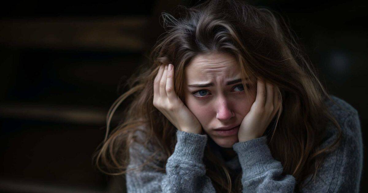 A visibly distressed woman holds her face in her hands, capturing the emotional weight of being misunderstood or unfairly judged. The image reflects the theme of how outward calmness is often mistaken for truth, while real emotional pain is dismissed.