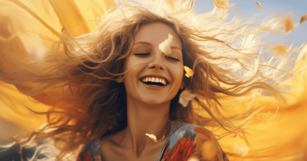 A joyful young woman with flowing hair smiles brightly outdoors, symbolizing the 8 parts of herself that she called back the day she cut narcissists loose.