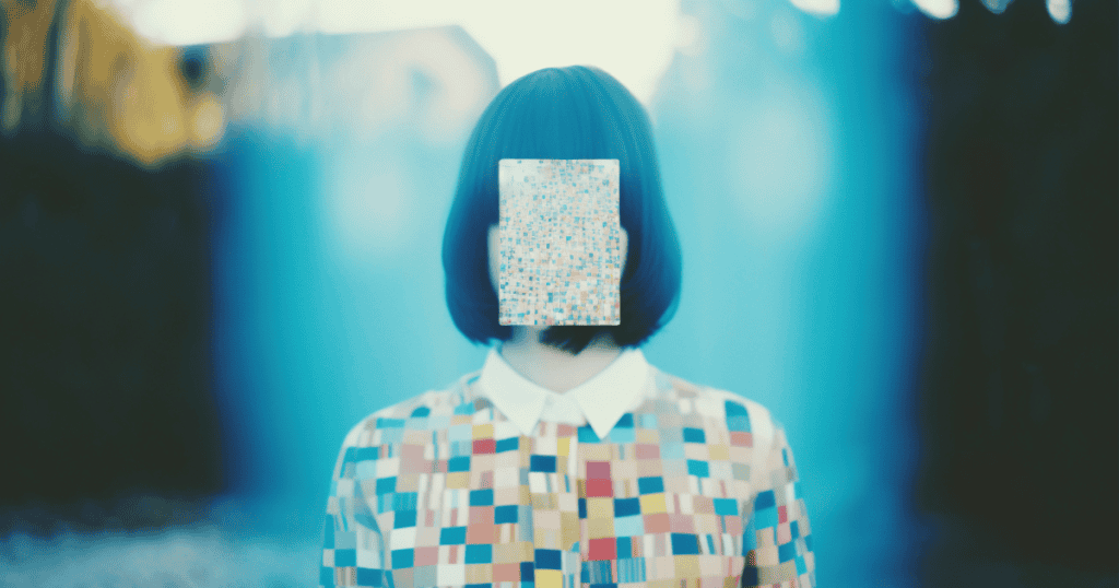 A person wearing a colorful checkered shirt has their face obscured by a pixelated square, symbolizing how boundaries disrupt and confuse a narcissistic gaslighter’s control.