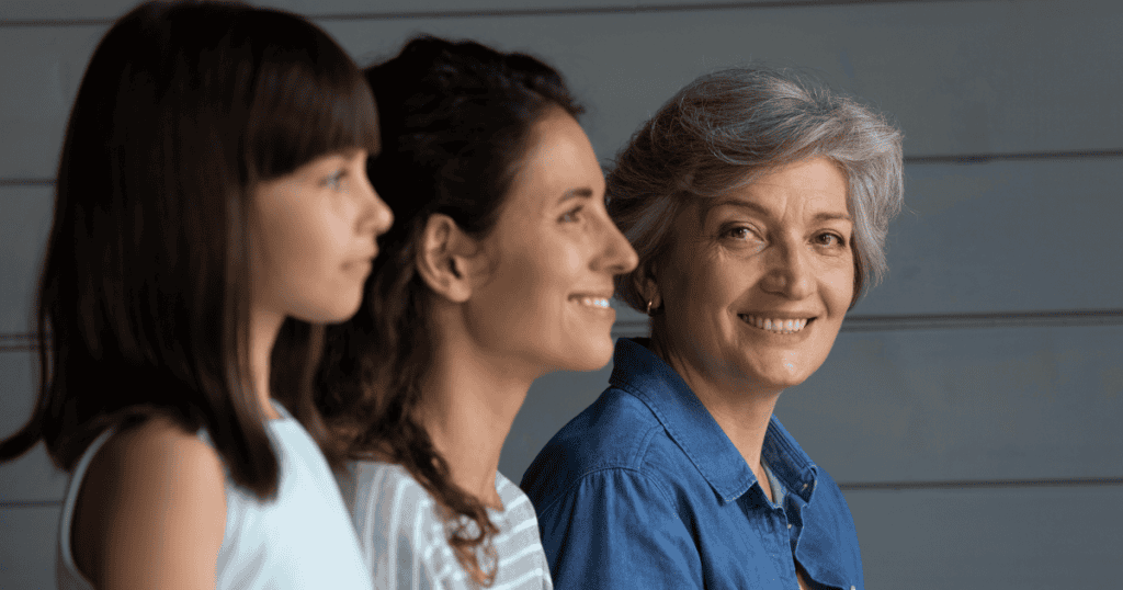 Three generations of women sit together, representing the generational or cultural narcissist who enforces legacy and tradition to maintain control.