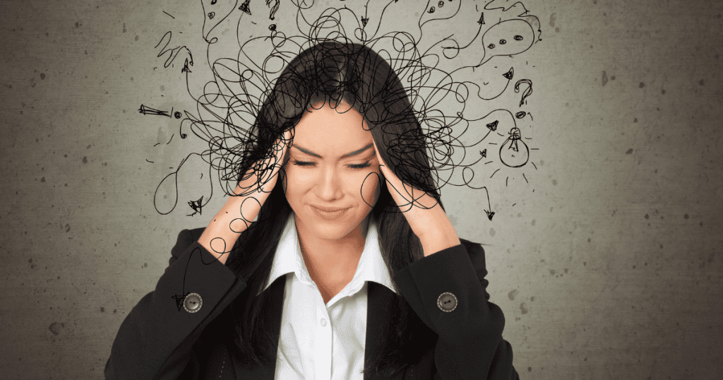 A woman presses her hands to her temples against a backdrop of chaotic scribbles and lightbulbs, illustrating the internal noise of a fractured psychological state.