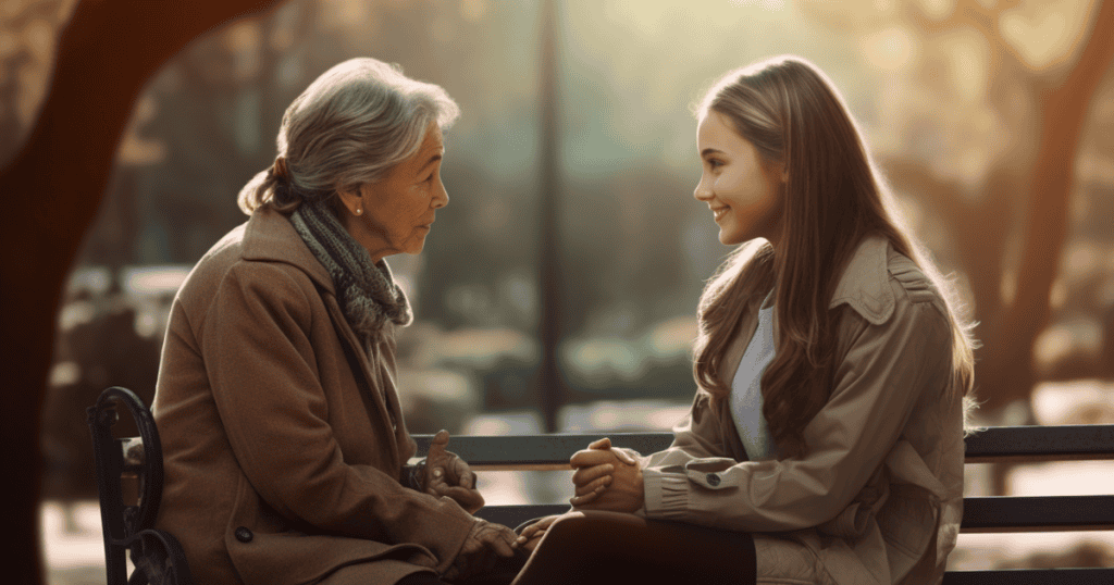 An elderly woman and a young girl sit on a park bench in soft light, sharing a quiet moment where memories seem to bridge the generations.