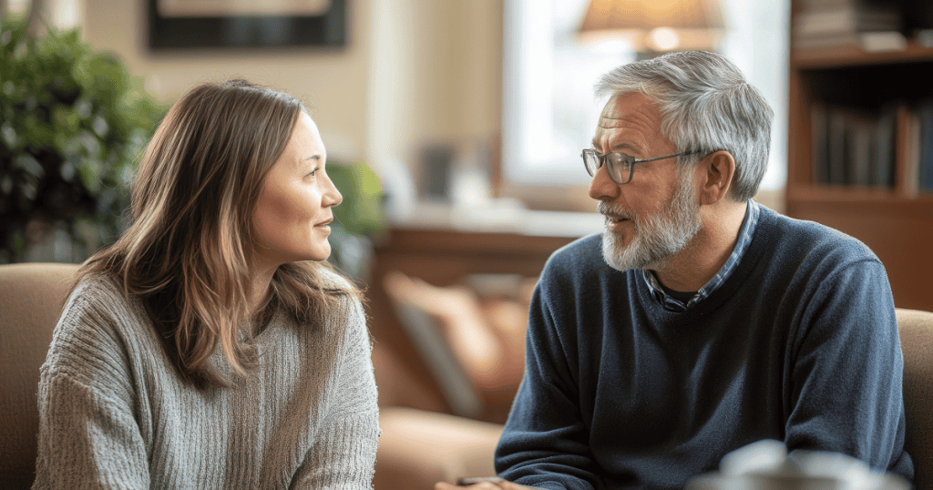 A younger woman and an older man engage in a focused conversation, marking the crucial shift where she finally refuses to play by his established rules.