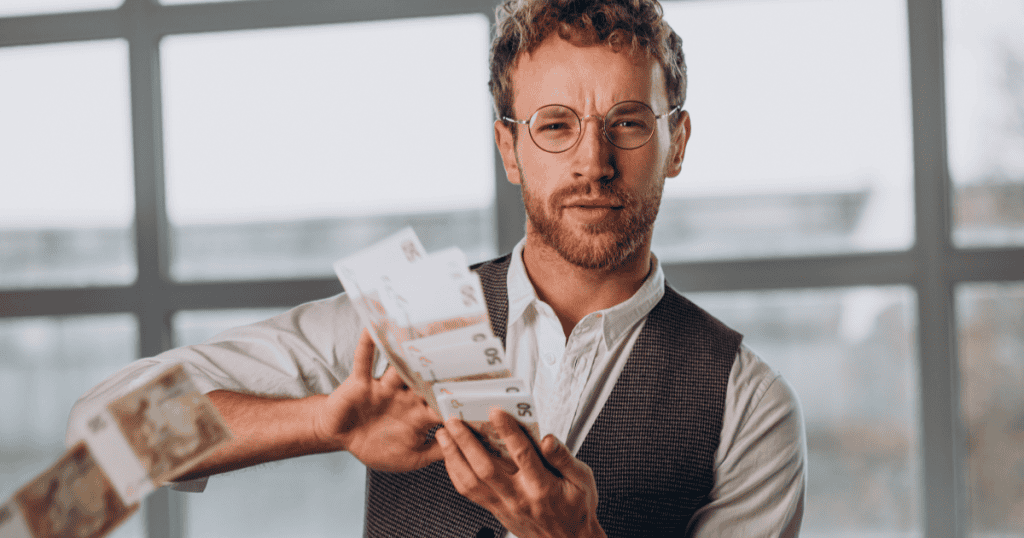 A man arrogantly flaunting a fistful of cash, embodying a narcissist's fatal belief that wealth places them above consequences and accountability.